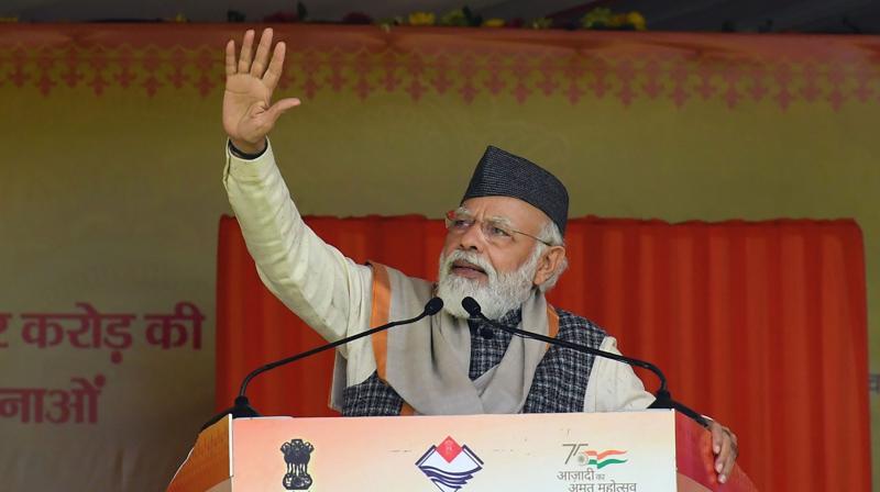 Prime Minister Narendra Modi addresses the programme to inaugurate & lay the foundation stone of various development projects in Haldwani, Thursday, Dec. 30, 2021. (PTI Photo)
