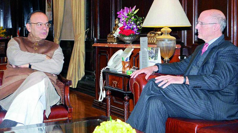 Union finance minister Arun Jaitley with Brookings Institution Washingtons chief economic advisor Strobe Talbott at a meeting  in New Delhi on Friday. (photo: PTI)