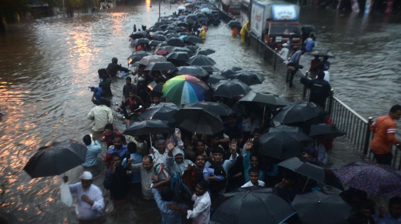 Roads turn rivers as rains bring Mumbai to a standstill