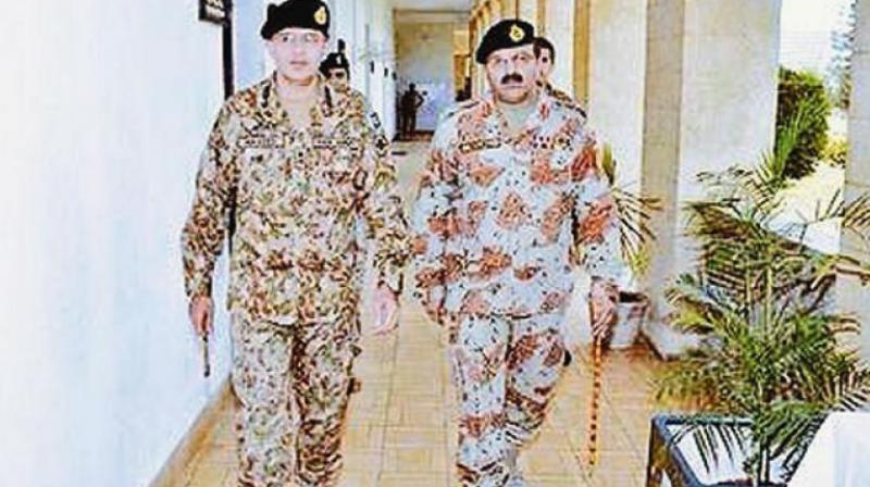 Lt. Gen Naveed Mukhtar (left) was appointed as director-general of the ISI. (Photo: Twitter)