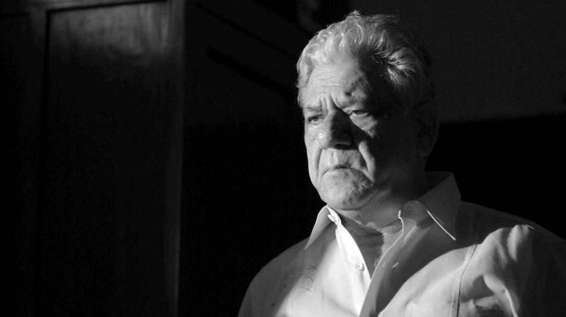 Om Puri, in a still from the film.