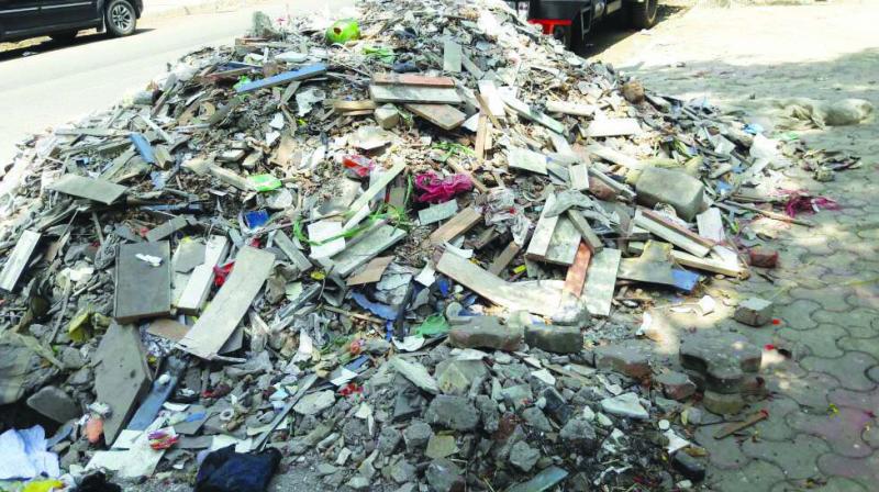 Debris dumped illegally on Singhania Road near Don Bosco school in Matunga. Debris dumped illegally on Singhania Road near Don Bosco school in Matunga.