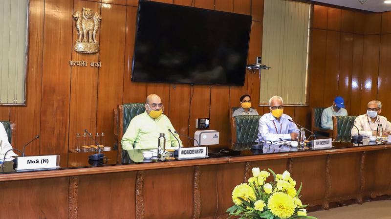 Union Home Minister Amit Shah chairs a review meeting of the Directors General of All Central Armed Police Forces, in New Delhi. PTI Photo
