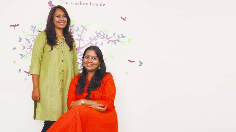 Vandhana Ramanathan (sitting) and Jinal Patel (standing)