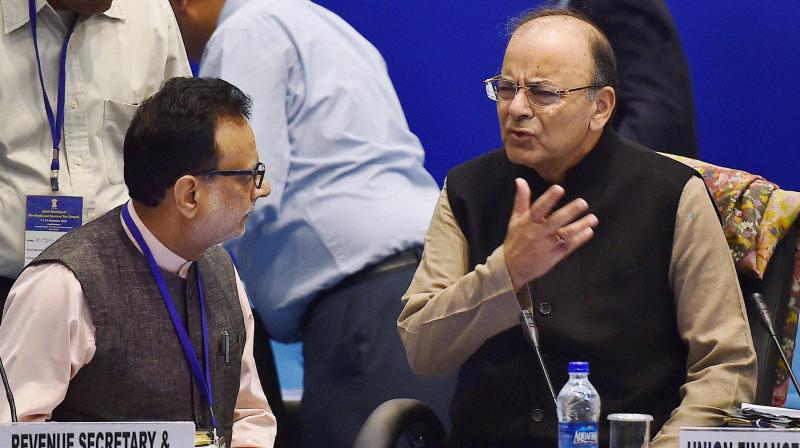 Union Finance Minister, Arun Jaitley and Revenue Secretary Hasmukh Adhia at the 6th Goods and Services Tax (GST) Council meeting in New Delhi on Sunday. (Photo: PTI) Union Finance Minister, Arun Jaitley and Revenue Secretary Hasmukh Adhia at the 6th Goods and Services Tax (GST) Council meeting in New Delhi on Sunday. (Photo: PTI)