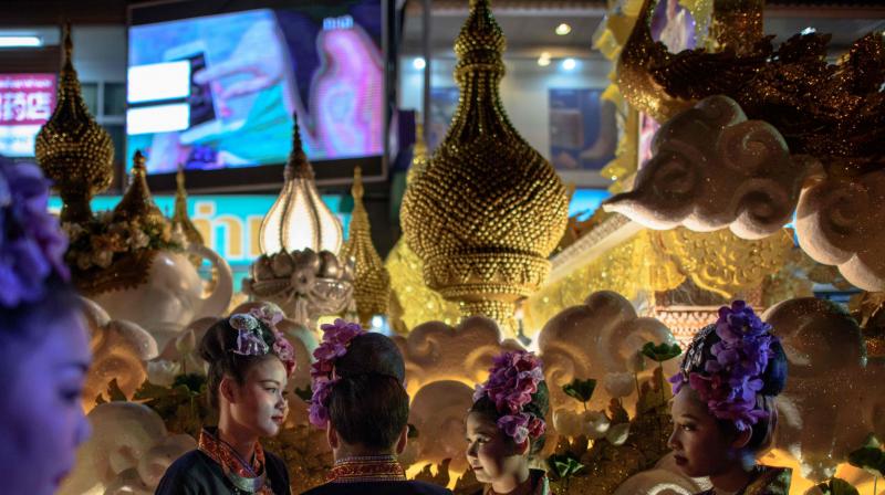 People celebrate Loy Krathong festival in Thailand