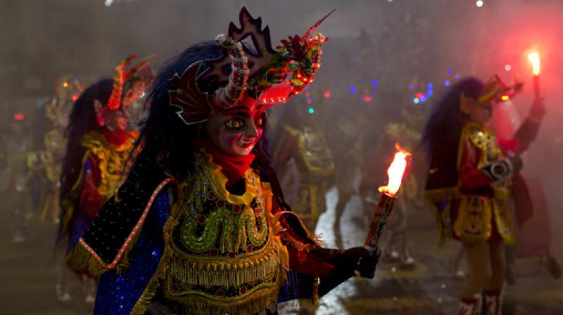 Confluence of pagan and Catholic cultures in Bolivian carnival
