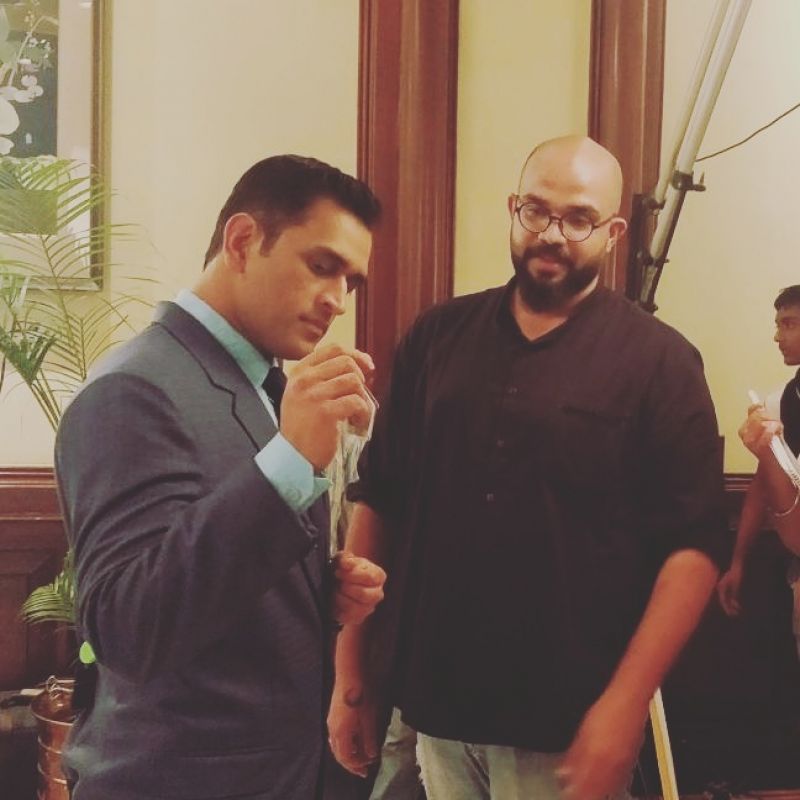 Dhoni and Roy share a light moment together during the shoot.