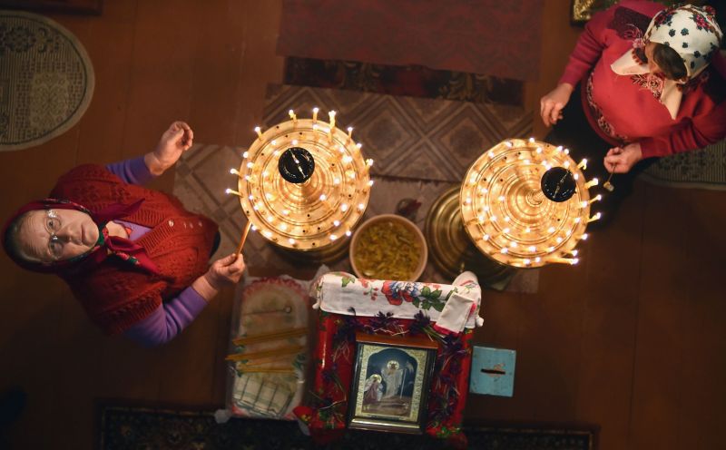 Belarussian villagers celebrate Orthodox Easter in the village of Prybalavichy, some 300 km south of Minsk, on April 8, 2018. People usually stay up late and attend an Orthodox vigil service. (Photo: AFP) Belarussian villagers celebrate Orthodox Easter in the village of Prybalavichy, some 300 km south of Minsk, on April 8, 2018. People usually stay up late and attend an Orthodox vigil service. (Photo: AFP)