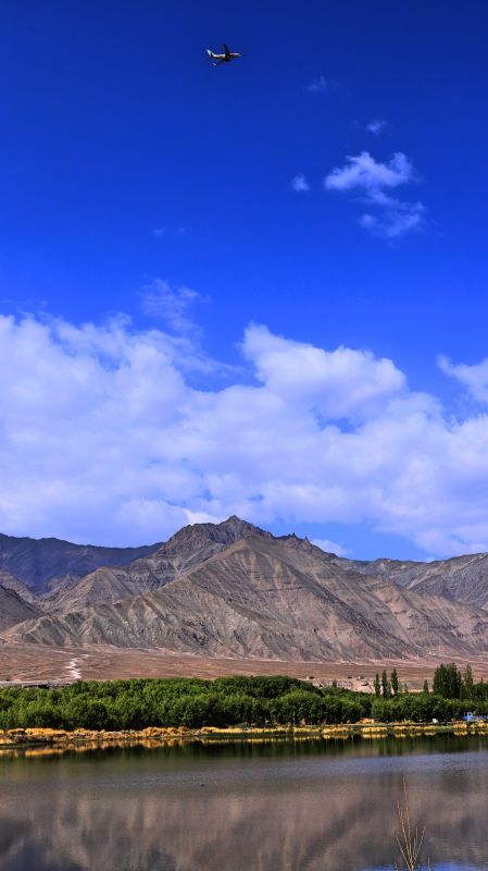 A flight takes off from Leh Airport