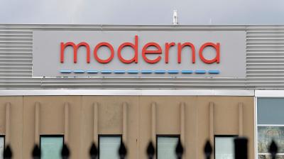 Moderna logo is seen at the Moderna campus in Norwood, Massachusetts. - The United States said December 11, 2020, it was purchasing 100 million more doses of Moderna's Covid-19 vaccine candidate, amid reports the country passed on the opportunity to secure more supply of the Pfizer jab. (AFP)