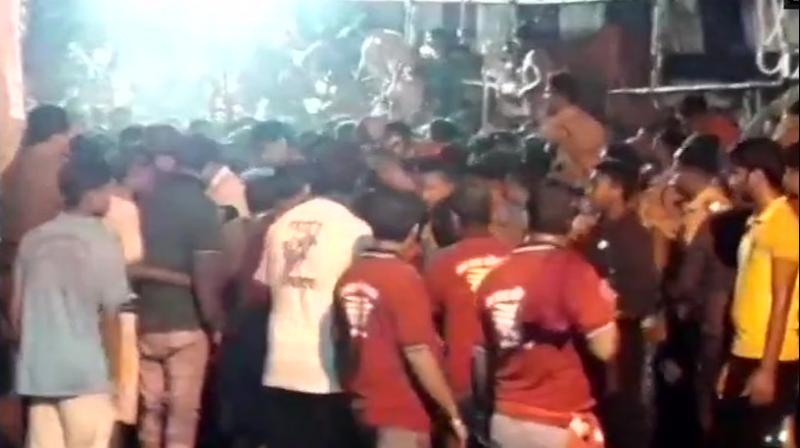 According to preliminary investigation, devotees in massive numbers gathered at the temple on the third Monday of the Shravan month as per the Hindu calendar. (Photo: Twitter | ANI) According to preliminary investigation, devotees in massive numbers gathered at the temple on the third Monday of the Shravan month as per the Hindu calendar. (Photo: Twitter | ANI)