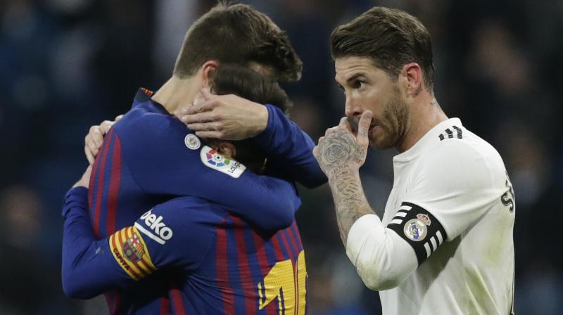 The victory, coming hot on the heels of the 3-0 win at the Santiago Bernabeu in the Copa del Rey semi-finals, was mostly down to the steely defending of Pique and Lenglet, who blocked seven shots between them, forming a human shield in front of goal. (Photo: AP) The victory, coming hot on the heels of the 3-0 win at the Santiago Bernabeu in the Copa del Rey semi-finals, was mostly down to the steely defending of Pique and Lenglet, who blocked seven shots between them, forming a human shield in front of goal. (Photo: AP)
