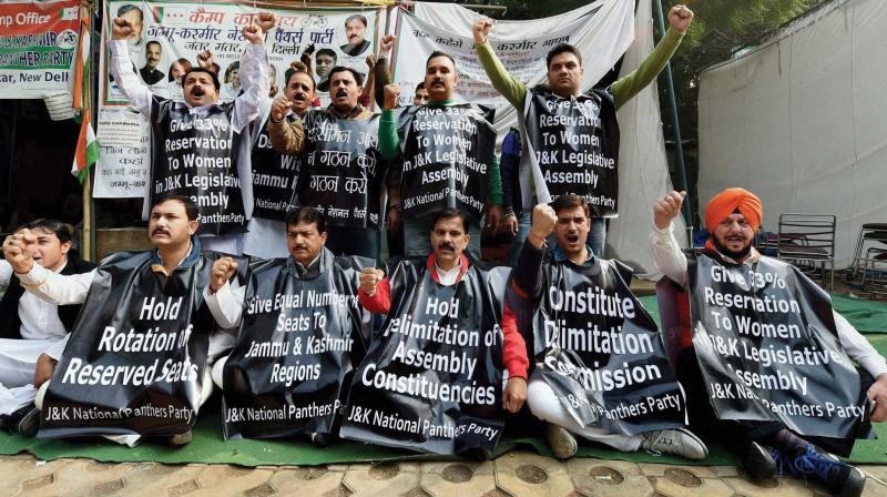 Activists of Jammu and Kashmir National Panthers Party (JKNPP) shout slogans to protest the alleged neglect of J&K by the Centre in the process of delimitation, at Jantar Mantar in New Delhi. (Photo: PTI) Activists of Jammu and Kashmir National Panthers Party (JKNPP) shout slogans to protest the alleged neglect of J&K by the Centre in the process of delimitation, at Jantar Mantar in New Delhi. (Photo: PTI)