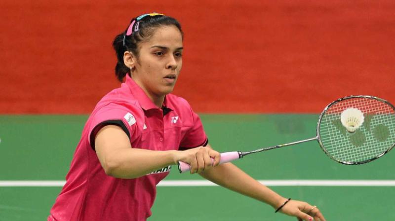 A gritty Saina Nehwal scripted a hard-fought straight-game win over former world champion Nozomi Okuhara of Japan to enter the women’s singles semifinals of the USD 350,000 Malaysia Masters on Friday. (Photo: AFP) A gritty Saina Nehwal scripted a hard-fought straight-game win over former world champion Nozomi Okuhara of Japan to enter the women’s singles semifinals of the USD 350,000 Malaysia Masters on Friday. (Photo: AFP)