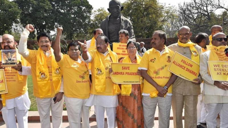 TDP MPs protest outside Parliament over special category status to Andhra Pradesh. (Photo: PTI) TDP MPs protest outside Parliament over special category status to Andhra Pradesh. (Photo: PTI)