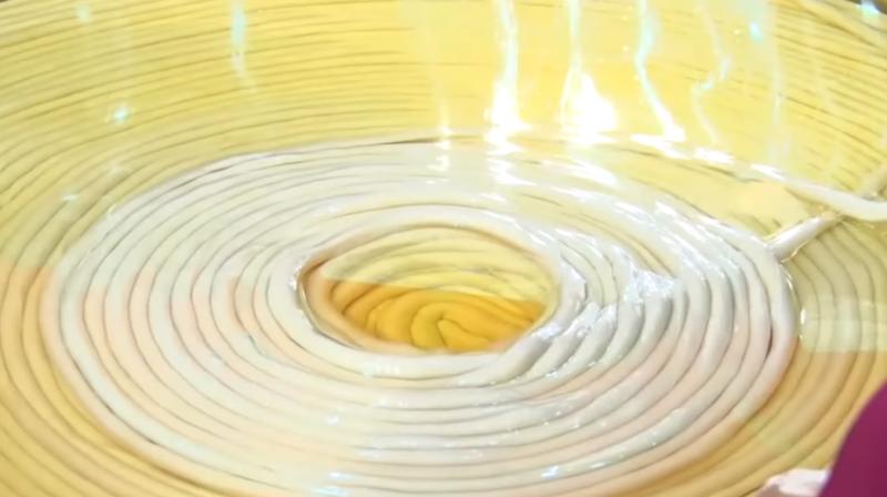 The Chinese chefs from Henan province broke Japan's previously-held record of 1,800 feet, set in 2001. (Photo: Youtube/GuinnessWorldRecords) The Chinese chefs from Henan province broke Japan's previously-held record of 1,800 feet, set in 2001. (Photo: Youtube/GuinnessWorldRecords)