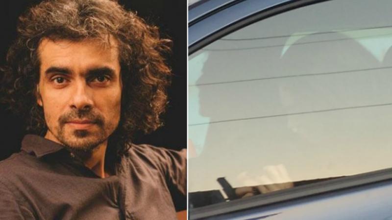 Imtiaz Ali spotted with a mystery girl. Imtiaz Ali spotted with a mystery girl.