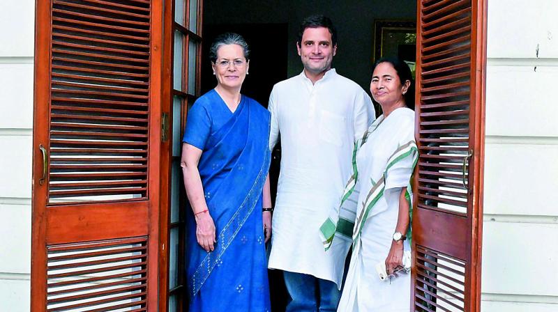 West Bengal CM Mamata Banerjee meets Congress President Sonia Gandhi and party vice-president Rahul Gandhi in New Delhi on Tuesday. (Photo: PTI) West Bengal CM Mamata Banerjee meets Congress President Sonia Gandhi and party vice-president Rahul Gandhi in New Delhi on Tuesday. (Photo: PTI)