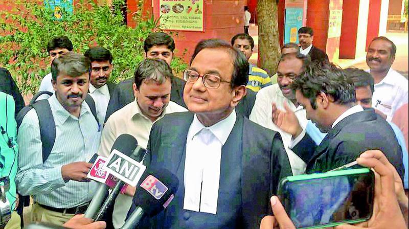 Former finance minister P. Chidambaram outside the Karnataka High Court in Bengaluru on Tuesday. (Photo: PTI) Former finance minister P. Chidambaram outside the Karnataka High Court in Bengaluru on Tuesday. (Photo: PTI)