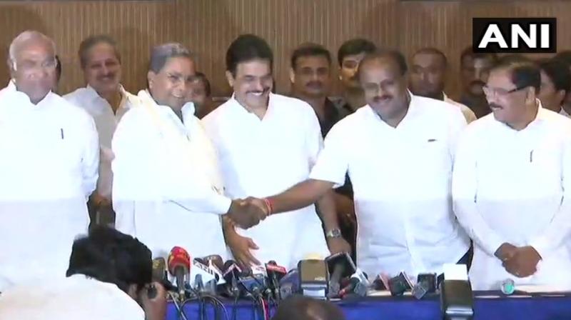 Congress and Janata Dal Secular or JD(S) announced the cabinet expansion and portfolio allocation for their coalition government in Karnataka on Friday. (Photo: ANI/Twitter) Congress and Janata Dal Secular or JD(S) announced the cabinet expansion and portfolio allocation for their coalition government in Karnataka on Friday. (Photo: ANI/Twitter)