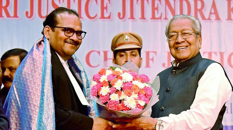 Andhra Pradesh Governor Biswa Bhushan Harichandan presents a bouquet to new Chief Justice of Andhra Pradesh High Court Justice Jitendra Kumar Maheswari after his oath taking ceremony on Monday in Vijayawada. (Photo: DC) Andhra Pradesh Governor Biswa Bhushan Harichandan presents a bouquet to new Chief Justice of Andhra Pradesh High Court Justice Jitendra Kumar Maheswari after his oath taking ceremony on Monday in Vijayawada. (Photo: DC)