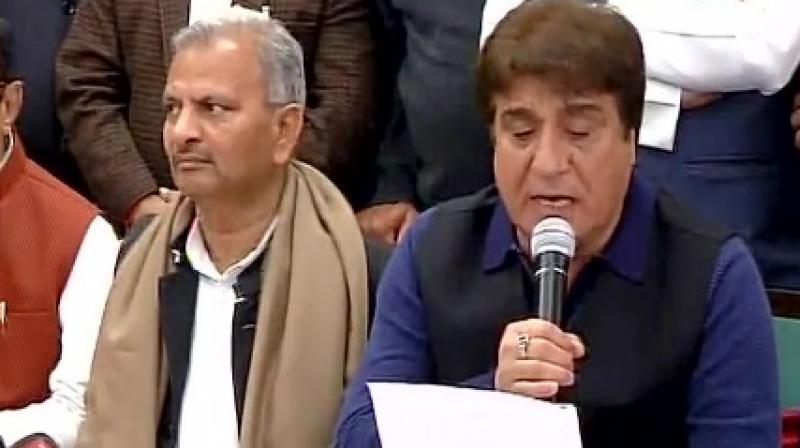 SP leader Naresh Uttam and Congress leader Raj Babbar at the press conference in Lucknow. (Photo: Twitter) SP leader Naresh Uttam and Congress leader Raj Babbar at the press conference in Lucknow. (Photo: Twitter)