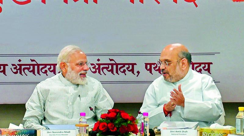 Prime Minister Narendra Modi with BJP president Amit Shah. (Photo: PTI) Prime Minister Narendra Modi with BJP president Amit Shah. (Photo: PTI)