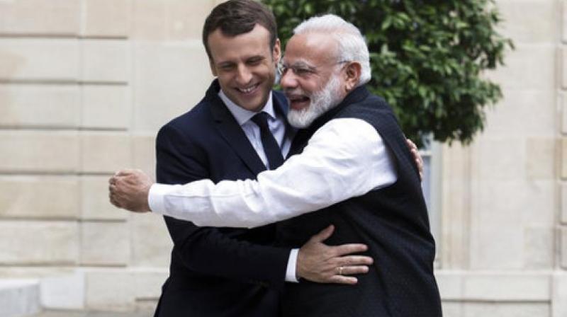 Narendra Modi had given Trudeau a cool reception, but he is expected to be much more welcoming for Macron after a warm meeting between the two in Paris 2017. (Photo: File) Narendra Modi had given Trudeau a cool reception, but he is expected to be much more welcoming for Macron after a warm meeting between the two in Paris 2017. (Photo: File)