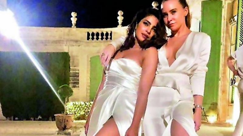 Priyanka Chopra (L) and Sophie Turner (R) Priyanka Chopra (L) and Sophie Turner (R)