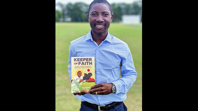 Former Zimbabwean cricketer Tatenda Taibu poses with his book Keeper Of Faith. Former Zimbabwean cricketer Tatenda Taibu poses with his book Keeper Of Faith.