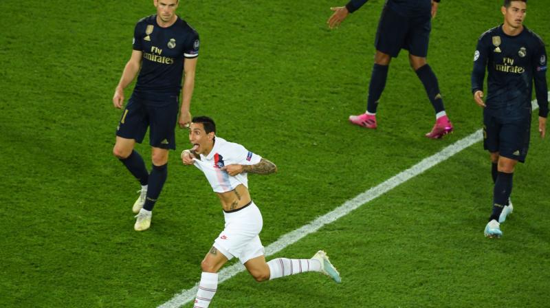 Angel Di Maria scored twice in a vintage performance to help Paris Saint-Germain outclass Real Madrid 3-0 in their opening Champions League Group A game on Wednesday. (Photo:AFP) Angel Di Maria scored twice in a vintage performance to help Paris Saint-Germain outclass Real Madrid 3-0 in their opening Champions League Group A game on Wednesday. (Photo:AFP)