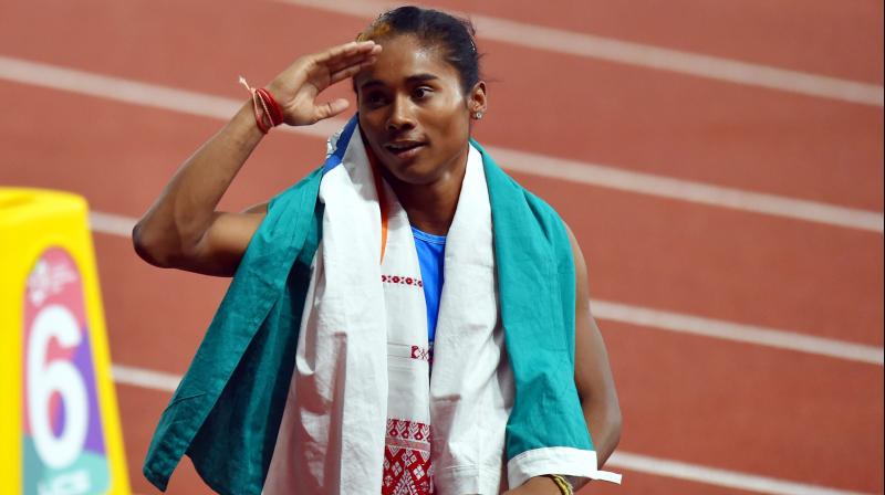 Indian sprinter Hima Das has been ruled out of the World Championships 2019 due to a back injury, Athletics Federation of India (AFI) said on Wednesday. (Photo:PTI) Indian sprinter Hima Das has been ruled out of the World Championships 2019 due to a back injury, Athletics Federation of India (AFI) said on Wednesday. (Photo:PTI)