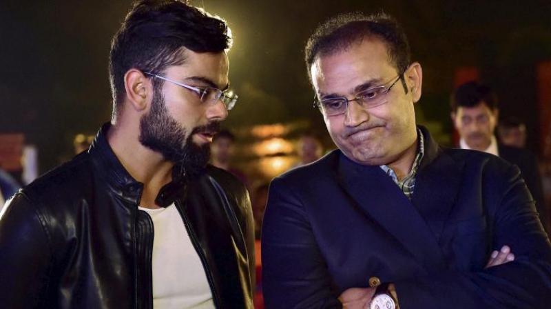 Former India opener and current Kings XI Punjab mentor Virender Sehwag on Friday said that he would want a bowler to become national team captain after Virat Kohli. (Photo: PTI) Former India opener and current Kings XI Punjab mentor Virender Sehwag on Friday said that he would want a bowler to become national team captain after Virat Kohli. (Photo: PTI)