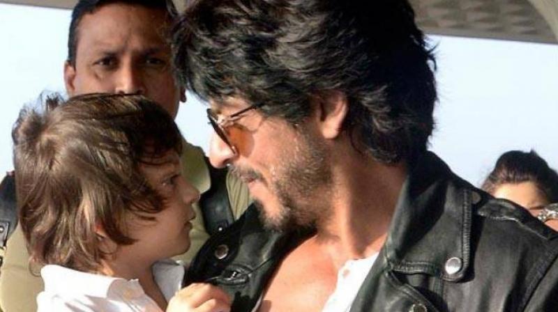 Shah Rukh Khan often gets spotted with son AbRam at various locations. Shah Rukh Khan often gets spotted with son AbRam at various locations.