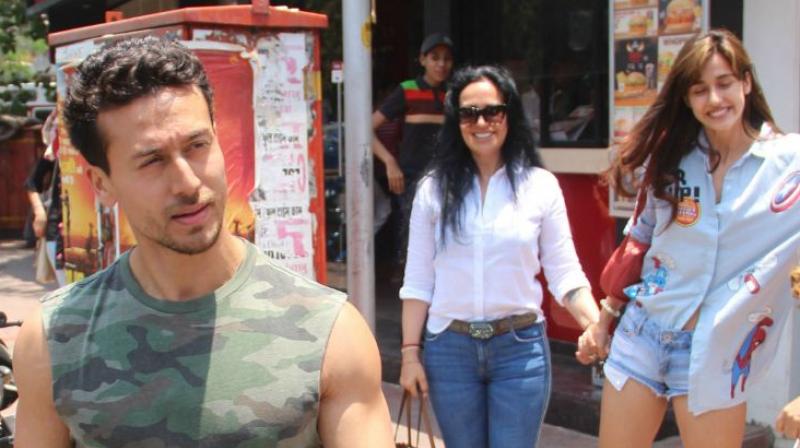 Tiger Shroff with Ayesha Shroff and Disha Patani spotted exiting a restaurant last month. Tiger Shroff with Ayesha Shroff and Disha Patani spotted exiting a restaurant last month.