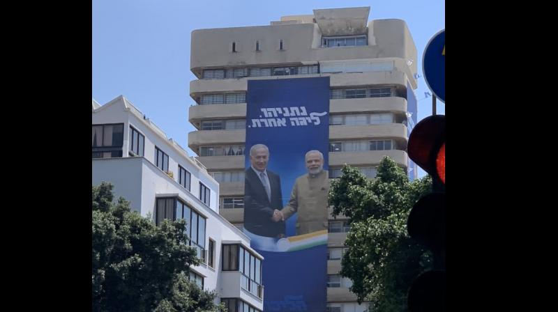Similar banners featuring US President Donald Trump and Russian President Vladimir Putin were also spotted on the same building. (Photo: Twitter | @AmichaiStein1) Similar banners featuring US President Donald Trump and Russian President Vladimir Putin were also spotted on the same building. (Photo: Twitter | @AmichaiStein1)