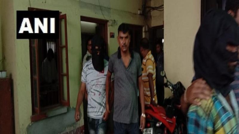 According to the police, over Rs 66,000 in cash and explicit photographs of women were found from the flat. (Photo: ANI) According to the police, over Rs 66,000 in cash and explicit photographs of women were found from the flat. (Photo: ANI)