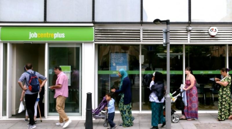 The report highlighted that hundreds of millions of people remain poor despite holding one or more jobs. (Photo: AFP) The report highlighted that hundreds of millions of people remain poor despite holding one or more jobs. (Photo: AFP)