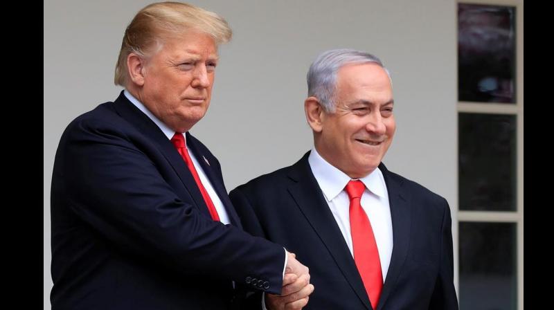 US President Donald Trump with Israel's PM Benjamin Netanyahu. (Photo: AP) US President Donald Trump with Israel's PM Benjamin Netanyahu. (Photo: AP)