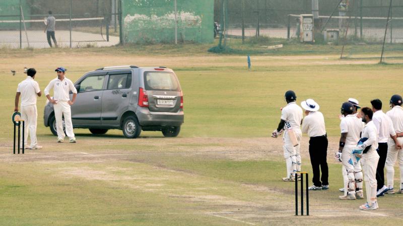 The man, who identified himself as Girish Sharma, tried to swerve his car twice on the 22-yard strip before he was stopped. (Photo: PTI) The man, who identified himself as Girish Sharma, tried to swerve his car twice on the 22-yard strip before he was stopped. (Photo: PTI)