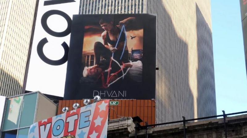 The 30-foot-high billboard featuring a model binding a Trump look-alike with red, white and blue rope while stomping on his face, was put up Tuesday as part of an advertising campaign by Dhvani, a Portland-based clothing company. (Photo: AP) The 30-foot-high billboard featuring a model binding a Trump look-alike with red, white and blue rope while stomping on his face, was put up Tuesday as part of an advertising campaign by Dhvani, a Portland-based clothing company. (Photo: AP)