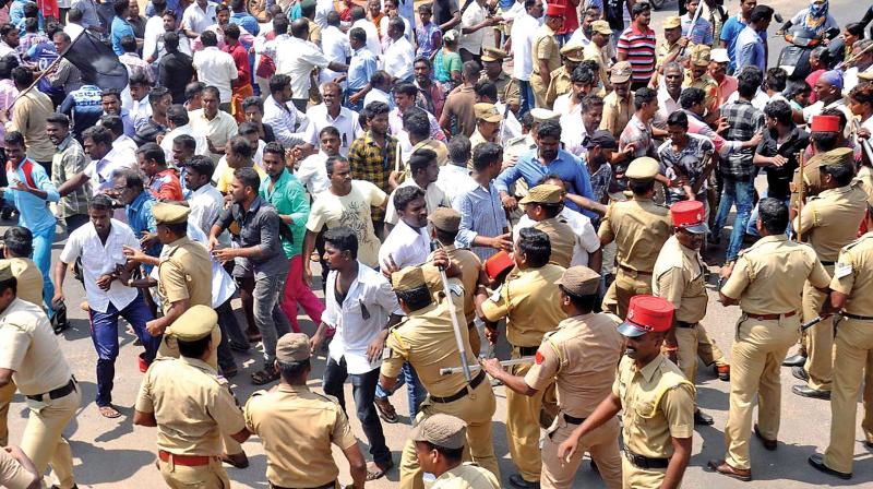 Police handling protesters. (file picture) Police handling protesters. (file picture)