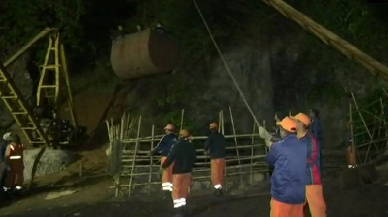 15 miners are trapped inside a 370-foot-deep illegal coal mine in East Jaintia Hills district since December 13 after water from a nearby river gushed in. (Photo: ANI) 15 miners are trapped inside a 370-foot-deep illegal coal mine in East Jaintia Hills district since December 13 after water from a nearby river gushed in. (Photo: ANI)