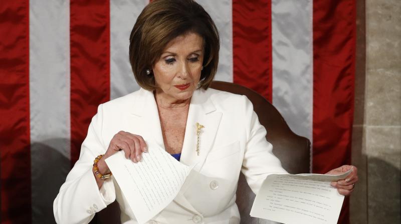 House Speaker Nancy Pelosi of Calif., tears her copy of President Donald Trumps s State of the Union address after he delivered it to a joint session of Congress on Capitol Hill in Washington. AP photo
