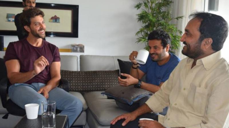 Hrithik Roshan with Vikas Bahl and Anand Kumar. Hrithik Roshan with Vikas Bahl and Anand Kumar.