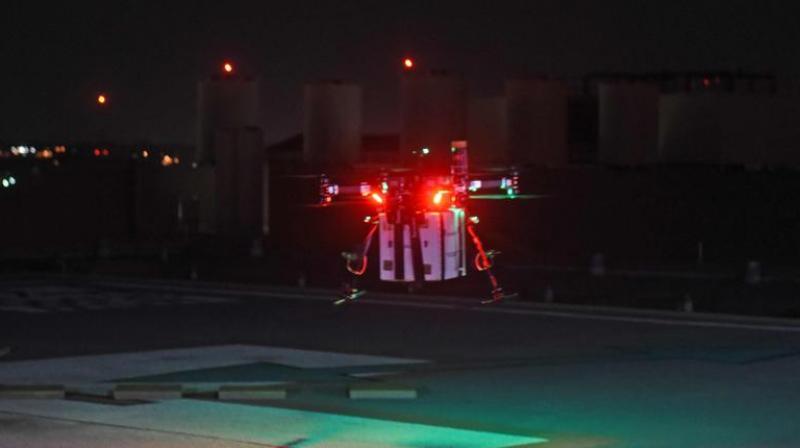The drone, which required a special clearance from aviation regulators, took off at 1:00 am on April 19 and flew at a height of 400 feet (120 meters) for about ten minutes before touching down at its destination.(Photo: AFP ) The drone, which required a special clearance from aviation regulators, took off at 1:00 am on April 19 and flew at a height of 400 feet (120 meters) for about ten minutes before touching down at its destination.(Photo: AFP )