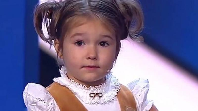 Bella, the 4-year-old Russian girl who speaks seven languages fluently. (Credit: YouTube) Bella, the 4-year-old Russian girl who speaks seven languages fluently. (Credit: YouTube)