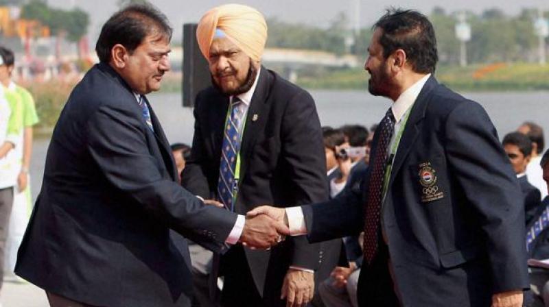 Scam-tainted Suresh Kalmadi and Abhay Chautala were elevated to life president position by IOA. (Photo: PTI) Scam-tainted Suresh Kalmadi and Abhay Chautala were elevated to life president position by IOA. (Photo: PTI)