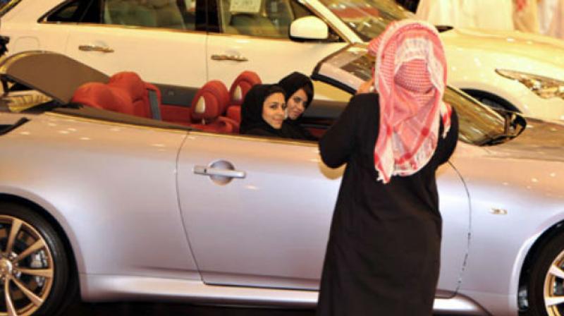Saudi women sit in a car at a luxury motor show, yet women are still banned from driving in the kingdom. (Photo: AFP) Saudi women sit in a car at a luxury motor show, yet women are still banned from driving in the kingdom. (Photo: AFP)